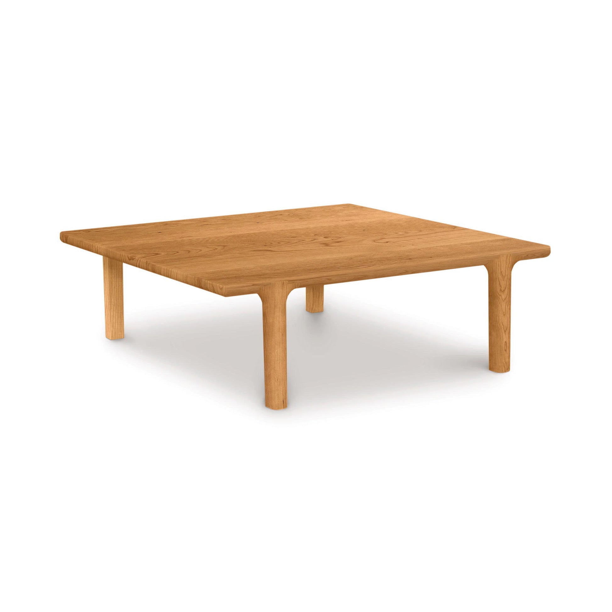 Sierra Square Coffee Table by Copeland Furniture, crafted from North American hardwood with rounded edges, displayed prominently.