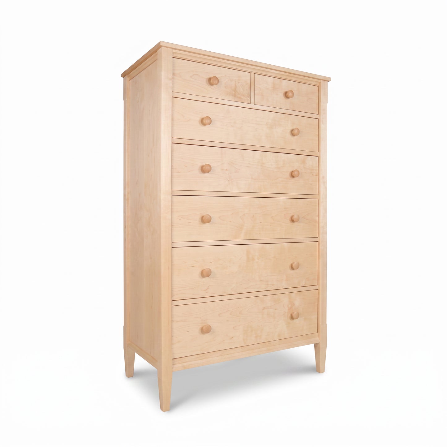 Maple Corner Woodworks Vermont Shaker 7-Drawer Chest crafted in maple hardwood with round knobs, American made, showcases quality craftsmanship.