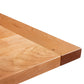 Vermont Shaker Harvest Extension Dining Table by Maple Corner Woodworks, showcasing smooth handcrafted wood grain and expert American craftsmanship.
