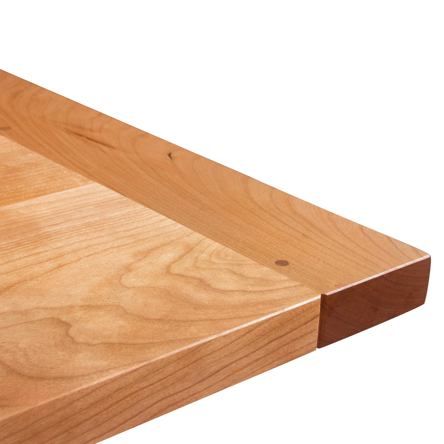 Vermont Shaker Harvest Extension Dining Table by Maple Corner Woodworks, showcasing smooth handcrafted wood grain and expert American craftsmanship.