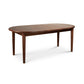 Vermont Shaker Oval Extension Dining Table by Maple Corner Woodworks in solid wood, showcasing expert craftsmanship and a smooth, polished finish.