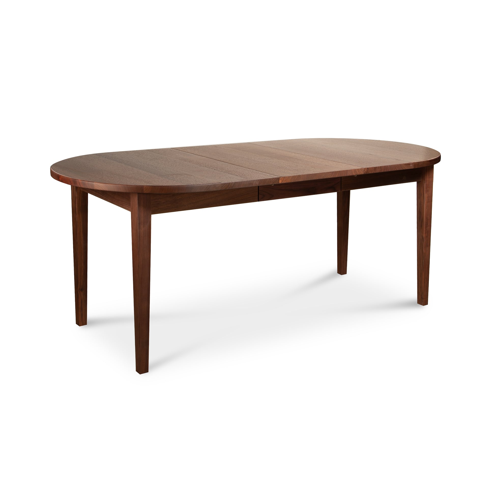 Vermont Shaker Oval Extension Dining Table by Maple Corner Woodworks in solid wood, showcasing expert craftsmanship and a smooth, polished finish.