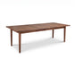 Vermont Shaker Dining Table by Maple Corner Woodworks with four sturdy legs and a natural wood finish, showcasing quality American craftsmanship.