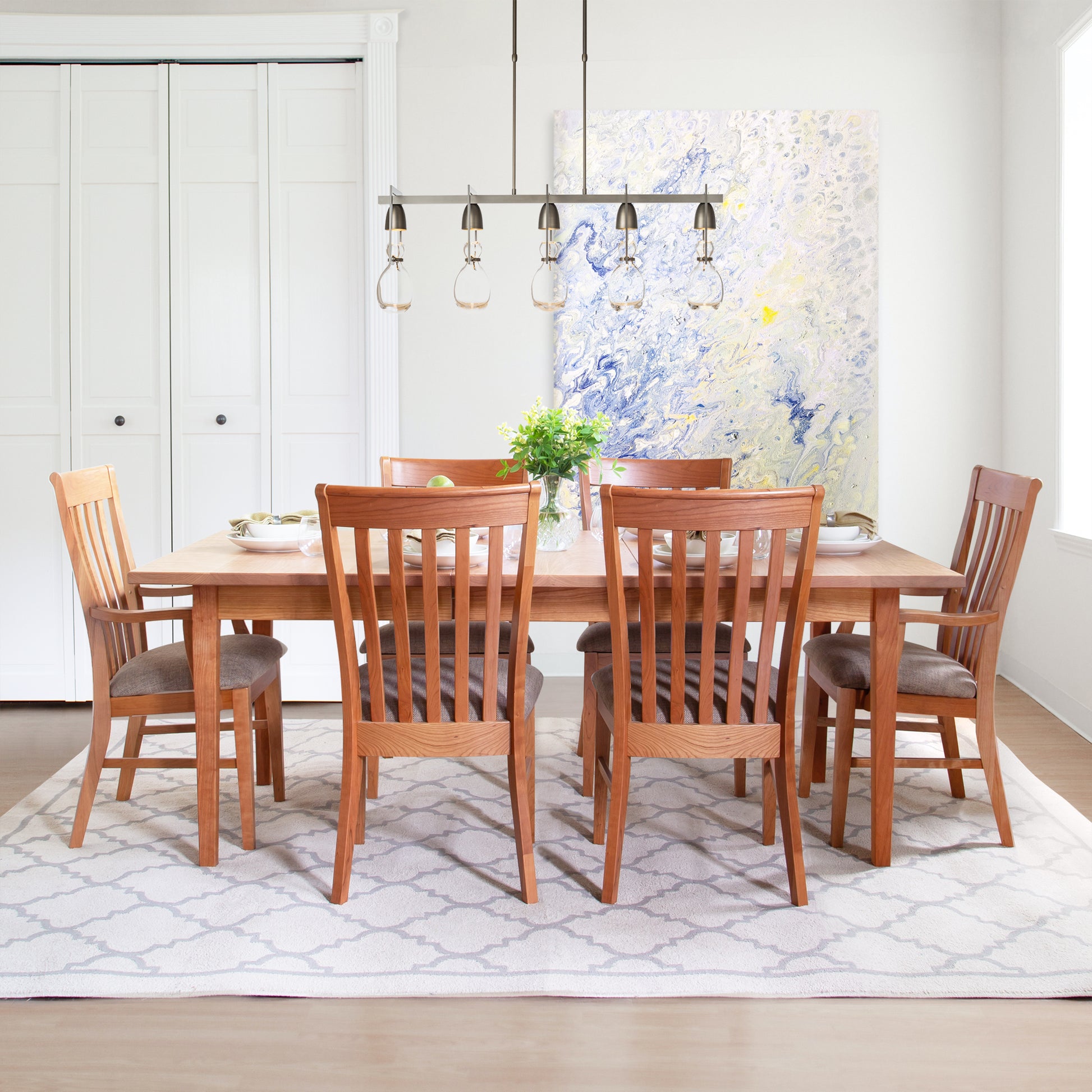 Maple Corner Woodworks Vermont Shaker Rectangular Extension Dining Table with six matching chairs, finely crafted in solid wood, American made.