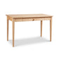 Vermont Shaker Writing Desk by Maple Corner Woodworks in light wood, with four straight legs and a center drawer, American-made craftsmanship.