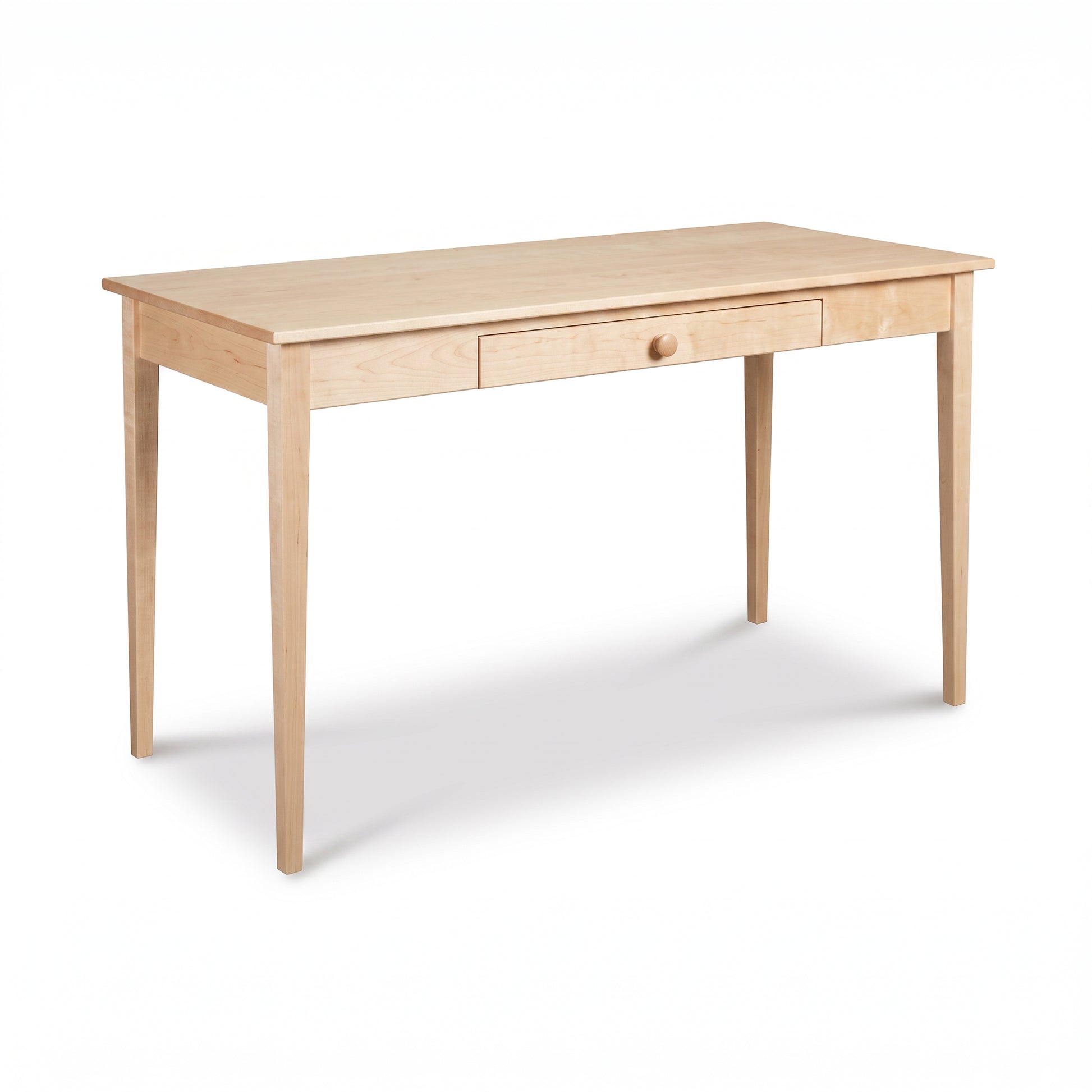 Vermont Shaker Writing Desk by Maple Corner Woodworks features a center drawer and four tapered legs, handcrafted in solid wood.