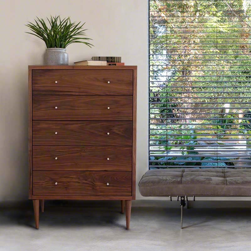 Vermont Furniture Designs dresser with radiant wood grain, showcasing heirloom-quality craftsmanship; matching bench enhances the set.