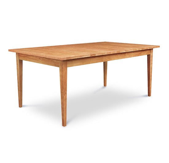 A wooden dining table on a white background.