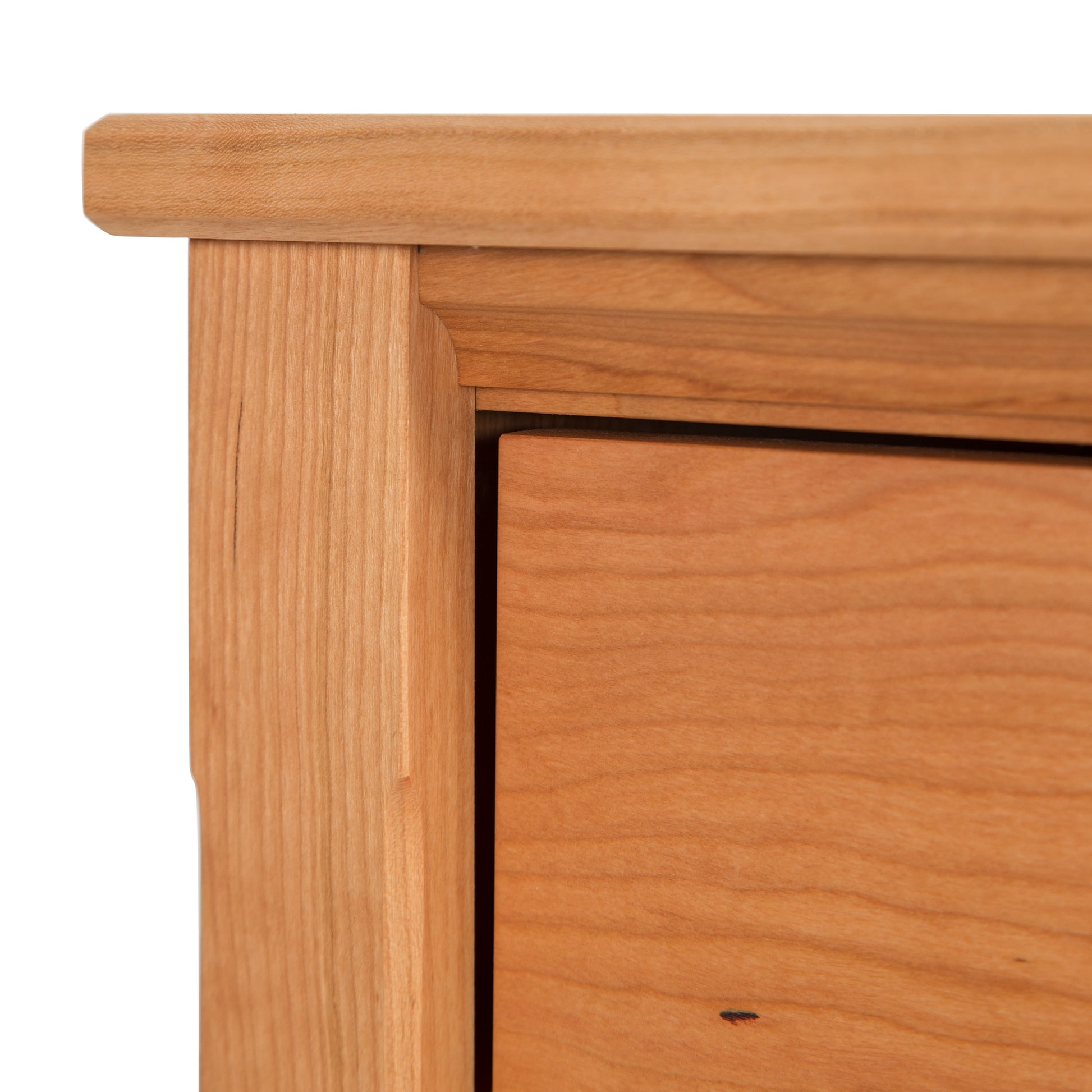 A close up image of a wooden dresser.